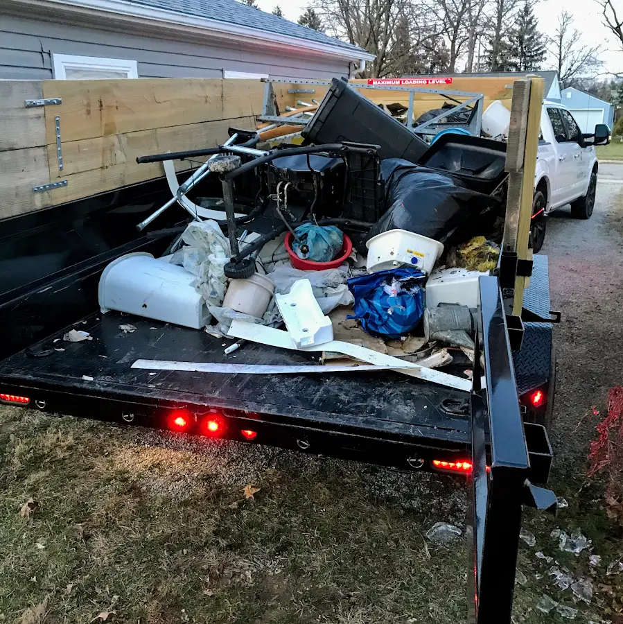 Roll-off dumpster delivered to a residential driveway in Larose
